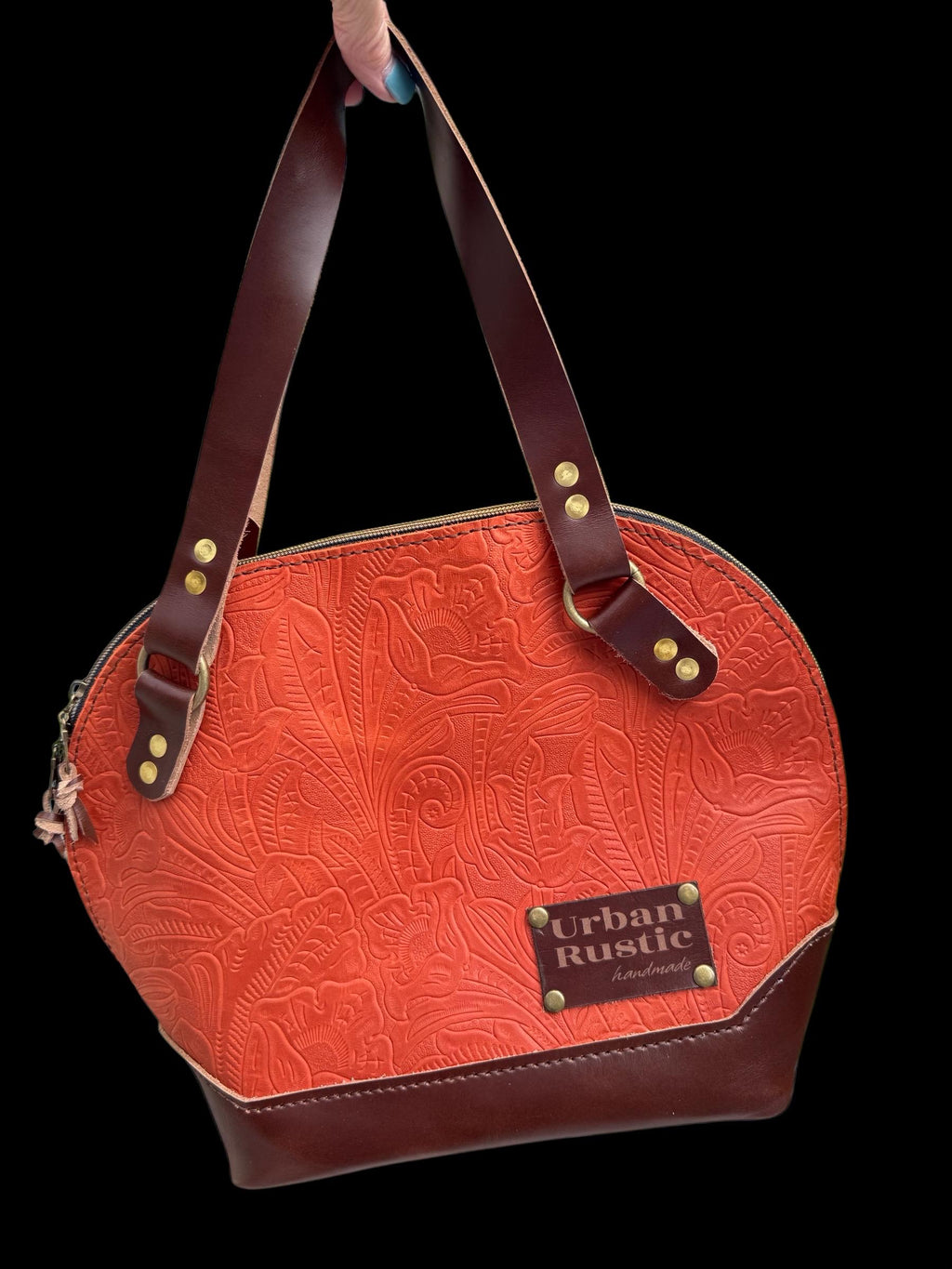 The Houston bag in in embossed Orange