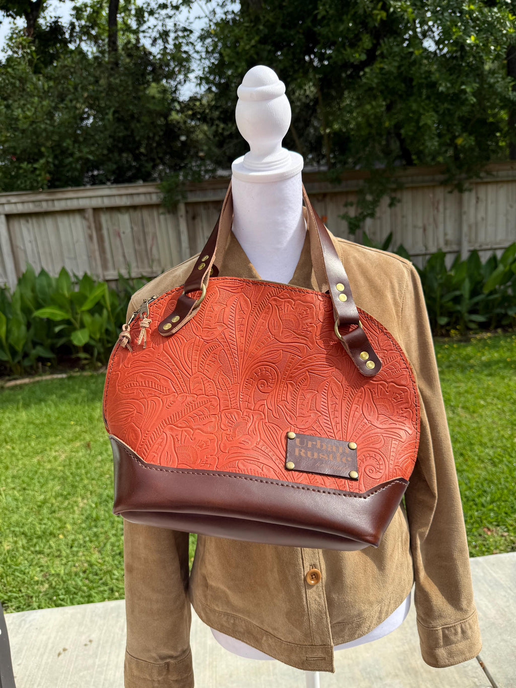 The Houston bag in in embossed Orange