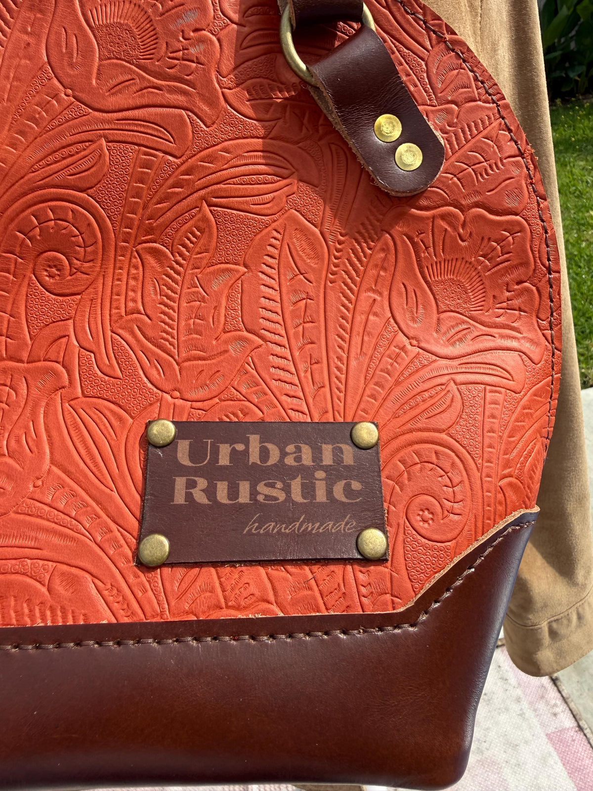 The Houston bag in in embossed Orange