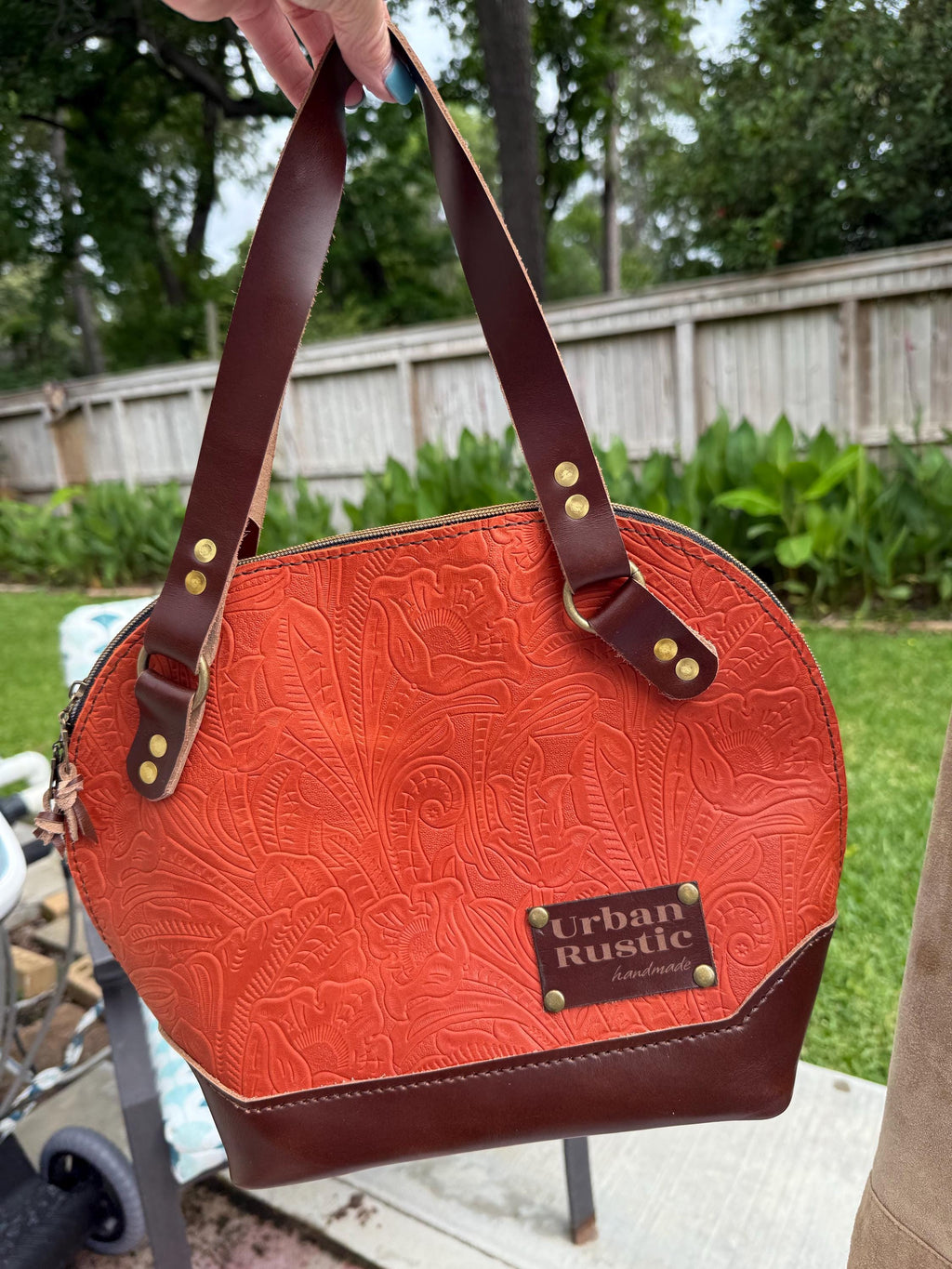 The Houston bag in in embossed Orange